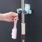 🥳HOT SALE🥳💞50K+ SOLD! Mop Clip Holder – From £6.98! Nail-free adhesive, holds 3kg & 2 hooks. Tidy space instantly – grab yours! ✅
